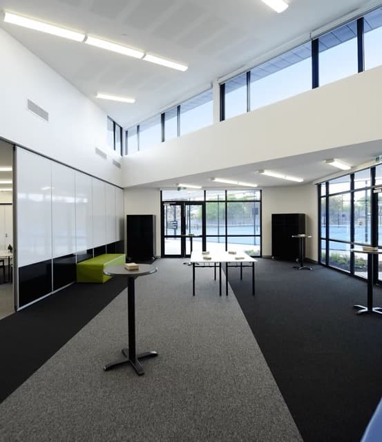 Eagle Room function space with tennis views through large windows
